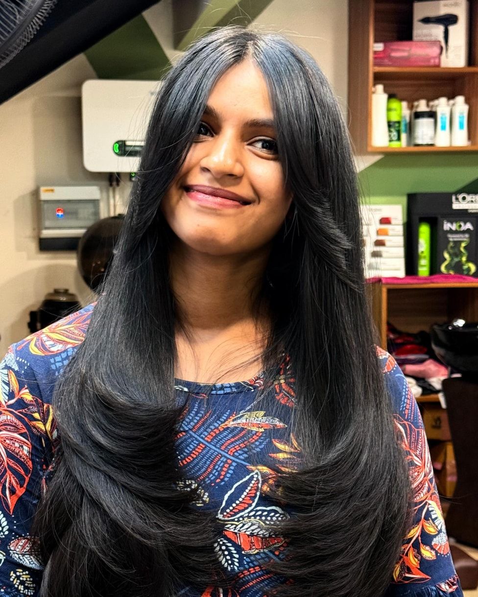 Custom long layers with face-framing bangs